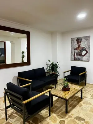a living room with two couches and a coffee table at Apartamento en Manga in Cartagena de Indias