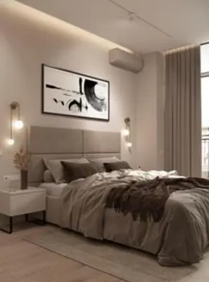 a bedroom with a large bed and a tv on the wall at Hotel El Confort in San Juan Nepomuceno