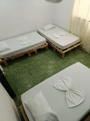 two mattresses sitting on the floor in a room at Casa yamulemao in Cartagena de Indias