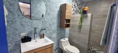 a bathroom with a sink and a mirror at Cabaña Mary Mar en Isla in Cartagena in Isla de Tierra Bomba