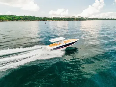 a boat in the water on a lake at Lancha Para 14 Personas - Cholon - Islas del Rosario - Cartagena in Cartagena de Indias