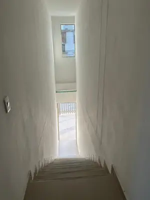 a view of a hallway with stairs in a building at Aparta suite in Cartagena de Indias