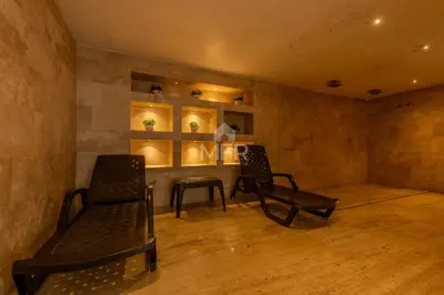 a room with two chairs and a table in it at Luxury beachfront Condo Edificio Morros 3 by Inmobiliaria MFR in Cartagena de Indias
