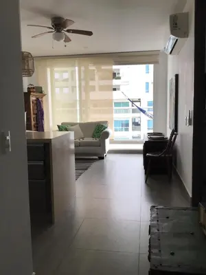a kitchen and living room with a ceiling fan at Cartagena Colombia in Cartagena de Indias