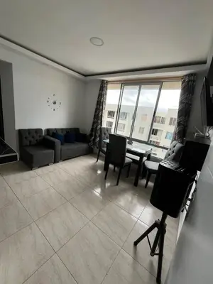a living room with a couch and a table at Apto en Alameda del rio cunjunto ruiseñor 1 piso 5 in Barranquilla