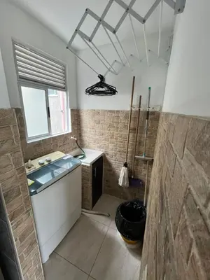 a bathroom with a sink and a window at Apto en Alameda del rio cunjunto ruiseñor 1 piso 5 in Barranquilla