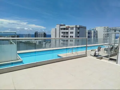 a balcony with a swimming pool on top of a building at Apartamento Cartagena exclusive in Cartagena de Indias