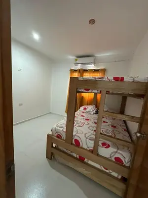 a bedroom with a bunk bed in a room at Apartamentos Altos de Guayabal in El Triunfo