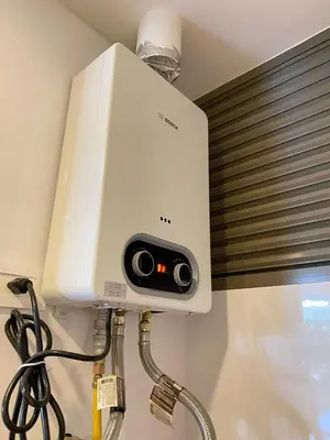 a water heater on the wall of a bathroom at Apartamento en Playa Manzanillo in Cartagena de Indias