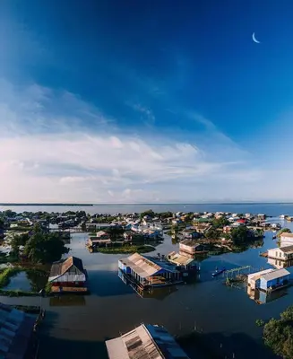 an aerial view of a harbor with houses and the water at Laguna tour in Nueva Venecia