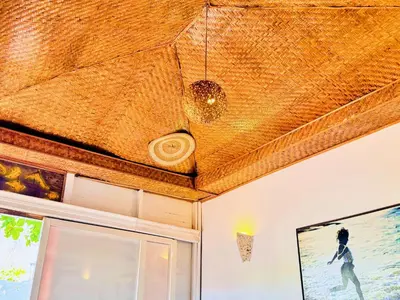 a ceiling with a wicker ceiling at Auaecoco Hotel in Cartagena de Indias
