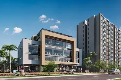 a large building on the side of a street at Apartamento con vista única cerca de la Uninorte in Puerto Colombia
