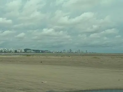 a view of a beach with a city in the background at Beach, kitesurfing loft en Cartagena, La Boquilla in Cartagena de Indias