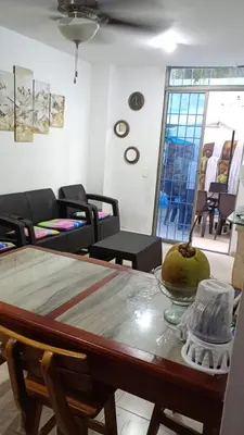 a living room with a table with a bowl on it at Apartamento con piscina in San Silvestre