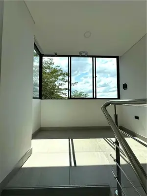 an empty room with a large window in a building at Hotel INdustrial in Sincelejo