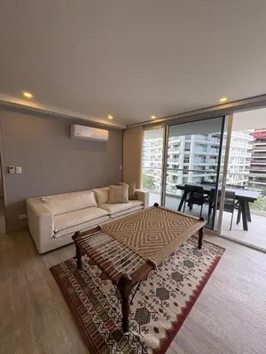 a living room with a couch and a coffee table at Como estar en casa! in Cartagena de Indias