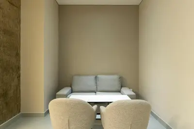 a living room with a couch and two chairs at Apto de Lujo con Vista al Mar en Playa Bello Horizonte in Santa Marta