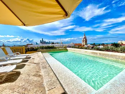 a swimming pool on the roof of a building at by Calamari Homes - El Porvenir 206 walled city in Cartagena de Indias