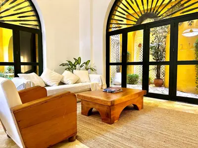 a living room with a couch and a coffee table at by Calamari Homes - El Porvenir 206 walled city in Cartagena de Indias
