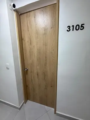 a door in a room with a sign that reads at Beautiful Ocean view apartment in Cartagena de Indias