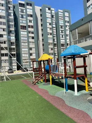 a playground with two benches and a swing at Cómodo apartamento en el norte de Barranquilla in Barranquilla