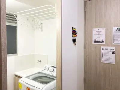 a kitchen with a stove and a sink at Comfortable apartment close to the beach 2 rooms in Cartagena de Indias