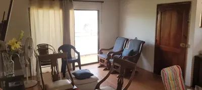 a room with chairs and a table and a window at Hospedaje Refugio del Caribe in Cartagena de Indias