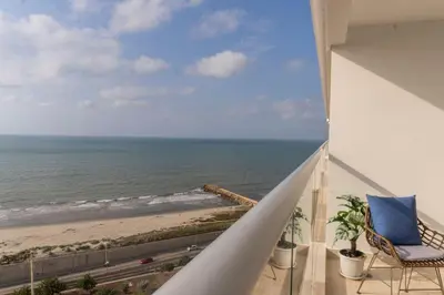 a balcony with a view of the beach at Suite Familiar Vista al Mar, Day Bed WiFi CB1315 in Cartagena de Indias