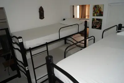 a room with two bunk beds in a room at Hotel Mar di Plata in Barranquilla