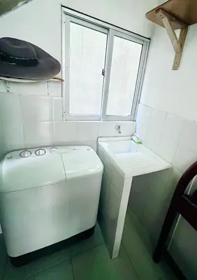 a white bathroom with a sink and a toilet at Refugio playero - A pasos del Mar in La Siriaca