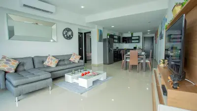 a living room with a couch and a table at Aparamento Vista Mar 1703 in Cartagena de Indias