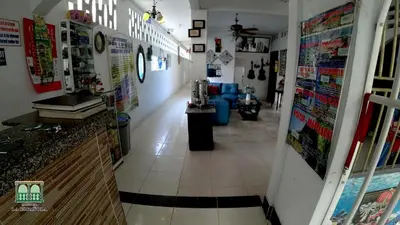 a hallway of a store with a counter in a room at Hostal La Española de Getsemani in Cartagena de Indias