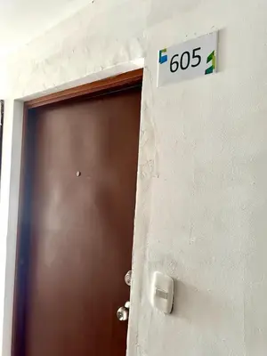 a door with a speed limit sign next to it at Julius Sky Apartment 1-Swimming pool and close to the beach in Cartagena de Indias
