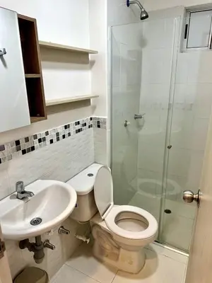 a bathroom with a toilet and a sink and a shower at Julius Sky Apartment 1-Swimming pool and close to the beach in Cartagena de Indias