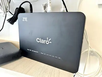 a laptop computer sitting on top of a table at Julius Sky Apartment 1-Swimming pool and close to the beach in Cartagena de Indias