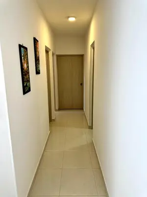 a hallway with a door and a tile floor at Julius Sky Apartment 1-Swimming pool and close to the beach in Cartagena de Indias