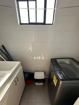 a small bathroom with a toilet and a sink at ApartaEstudio in Barranquilla