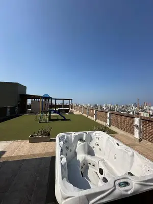 a bath tub sitting on top of a roof at ApartaEstudio in Barranquilla