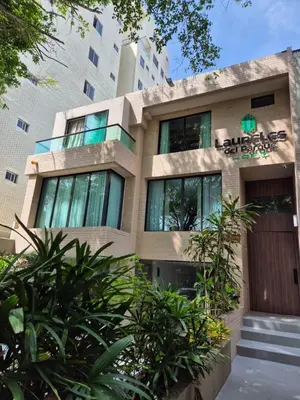 a building with plants in front of it at Laureles del parque loft in Barranquilla