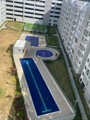 an overhead view of a swimming pool on the roof of a building at Lindo apartamento en el norte in Barranquilla