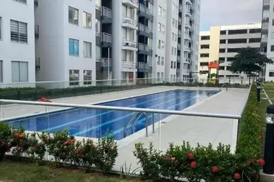 a swimming pool in the middle of a building at Apartmento En Miramar in Barranquilla