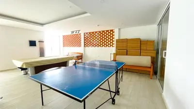 a ping pong table in a room at Magico Apartamento Frente al Mar 3 Habitaciones TV52 in Coveñas
