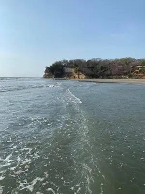 a view of a body of water with a beach at Cuatro Palmas Beach House in Cartagena de Indias