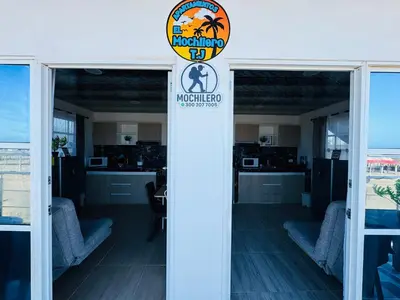 a sign for a motocinated sign in a building at Apartamentos el mochilero frente a la playa piso 2 apto 4 in Cartagena de Indias