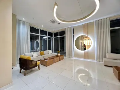 a living room with a couch and a table at Beautiful Studio close to the beach in Cartagena de Indias