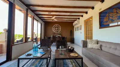 a living room with a couch and a table at Nautilus urban loft in Cartagena de Indias