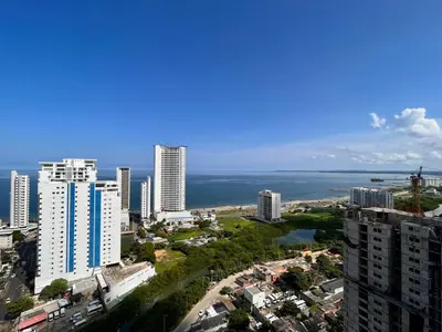 a view of a city with tall buildings and the ocean at Apartamento Aqua in Cartagena de Indias