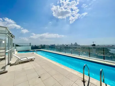 a swimming pool on the roof of a building at Apartamento Aqua in Cartagena de Indias