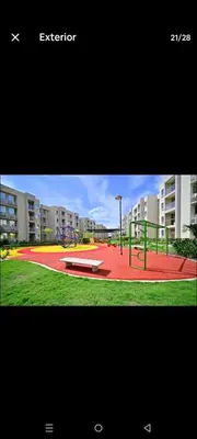 a picture of a playground in front of a building at Apartamento Cartagena Serena del Mar - Capriella in Manzanillo del Mar