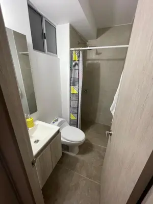 a bathroom with a toilet and a sink and a shower at Apartamento Cartagena Serena del Mar - Capriella in Manzanillo del Mar